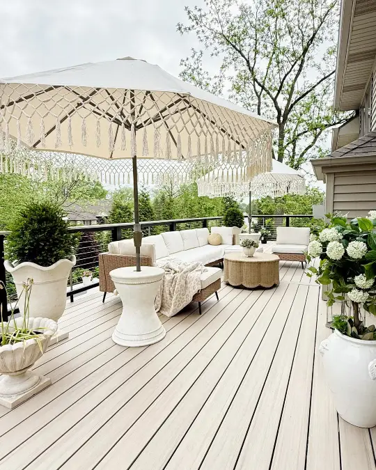 Warm Neutrals And Fringed Umbrellas