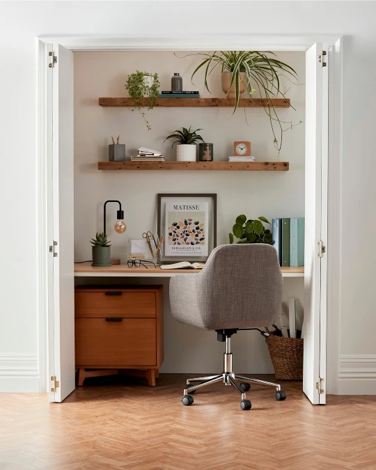 Warm Up a Closet Office With Wood and Greenery