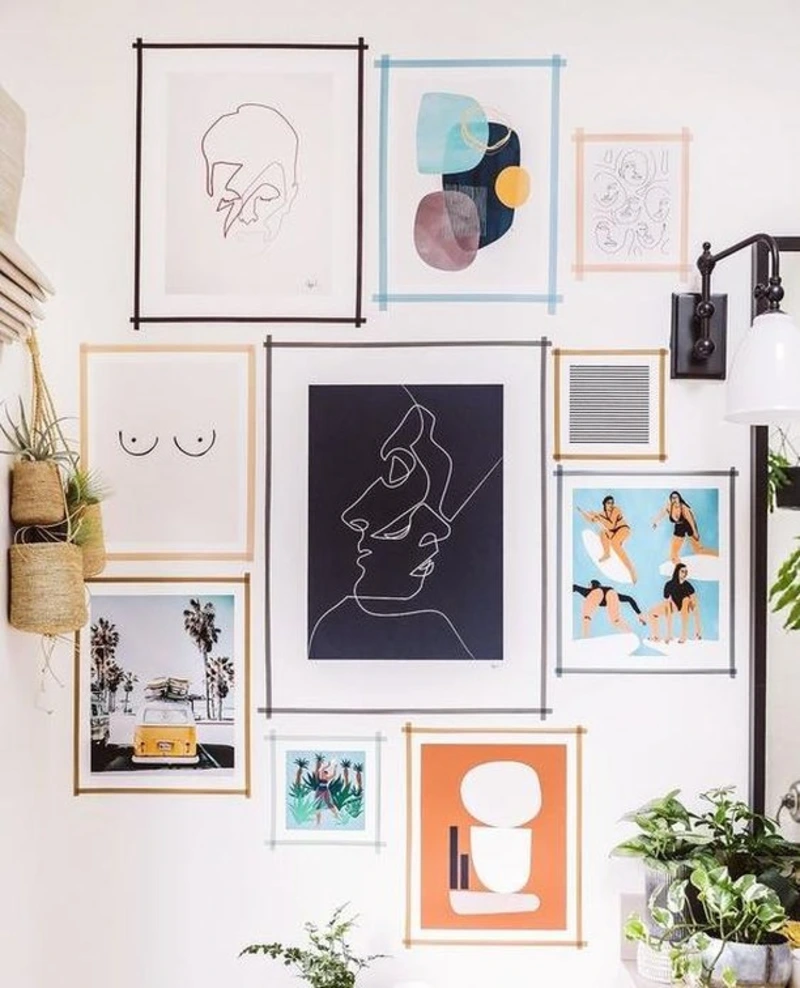 Washi tape gallery wall with minimalist line art and abstract graphic prints