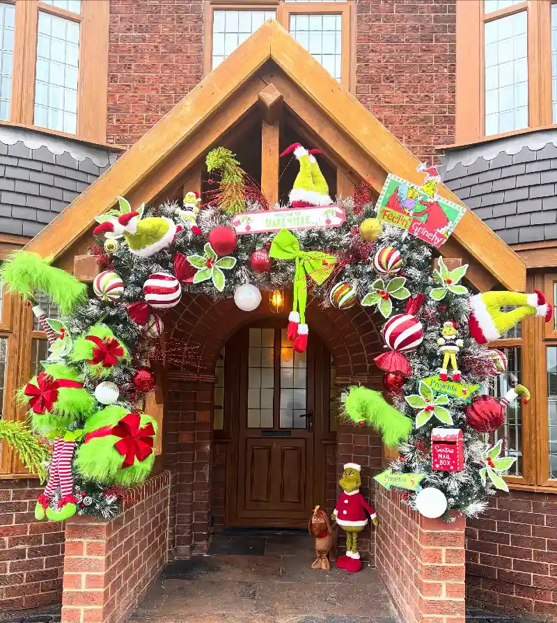 Whimsical Grinch Garland Arch with Lime Green Furry Accents and Red Striped Ornaments