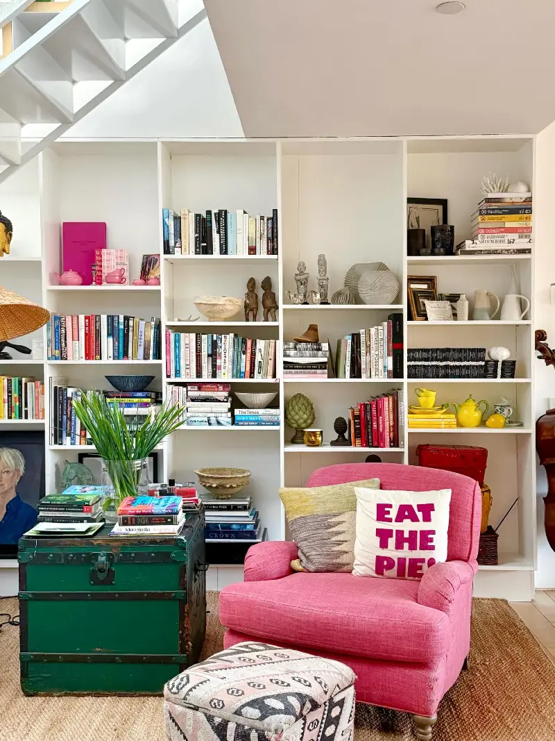 White Built-in Shelving with Bold Maximalist Accents