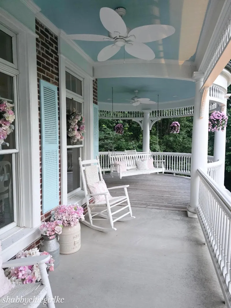 White Porch Swing with Robin's Egg Blue Ceiling and Light Blue Shutters