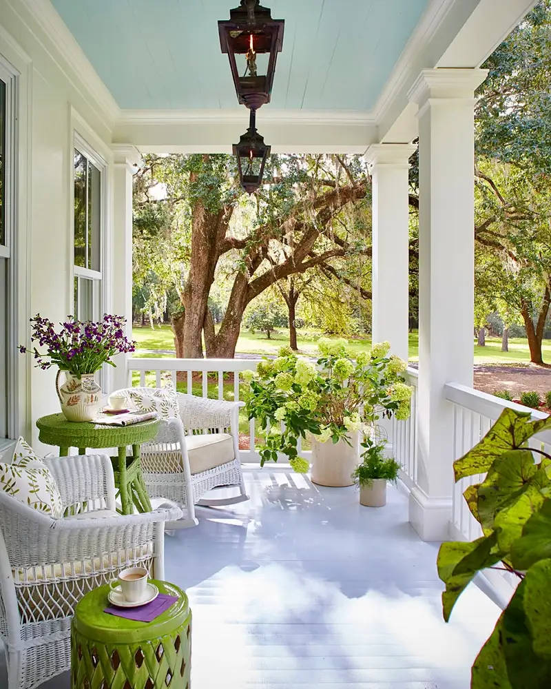 White Wicker Rocking Chairs with Lime Green Garden Stool and Haint Blue Ceiling