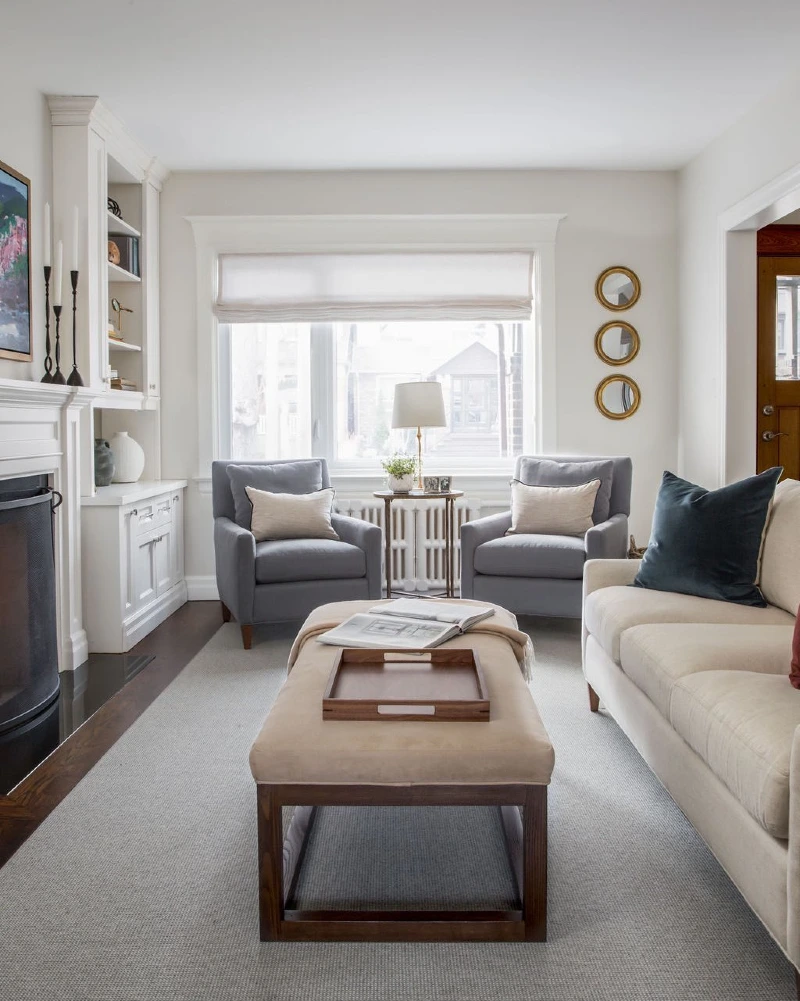 Window Framed Seating with Twin Accent Chairs and Center Ottoman