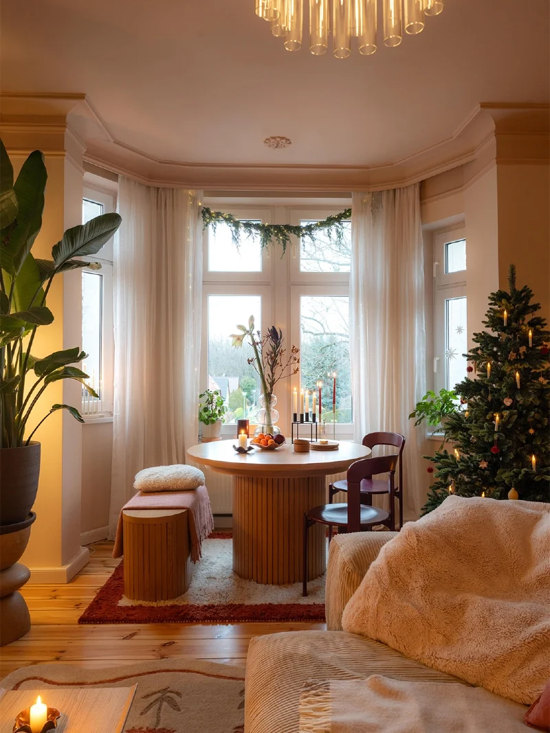 Airy White Sheer Curtains Framing a Tall Dining Bay Window
