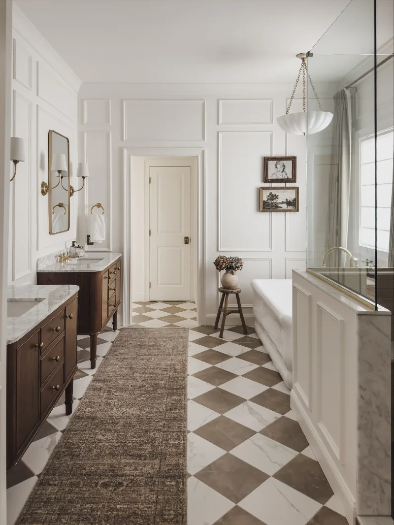 Brown and White Checkerboard Tile Floor with Dark Wood Vanities