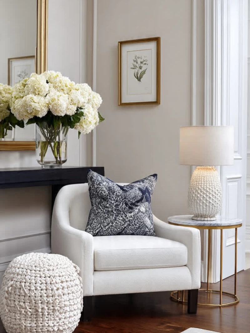 Cream Accent Chair with Marble Side Table and Textured Lamp