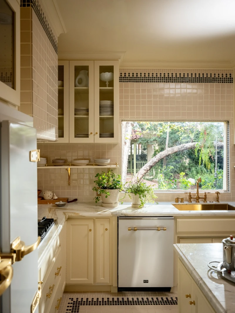 Cream Square Tile with Black Mosaic Border and Brass Sink