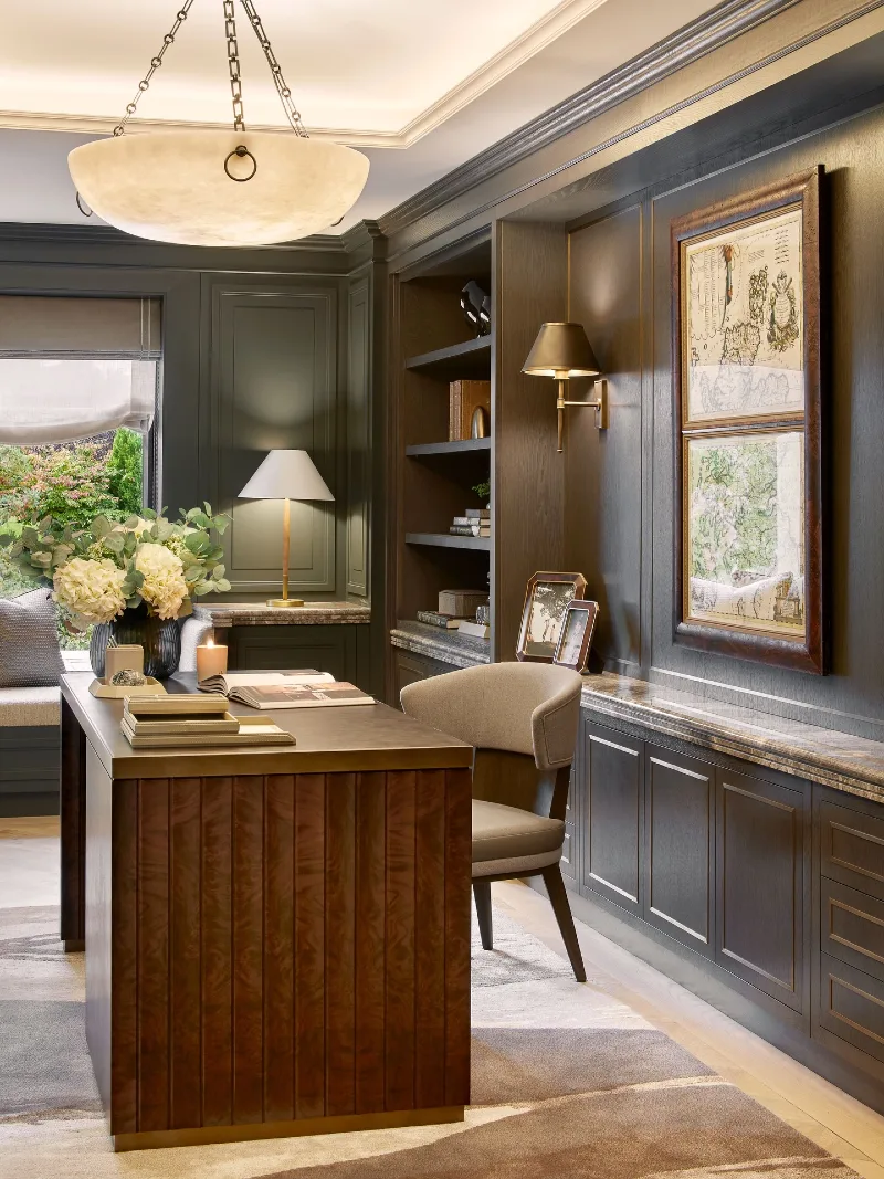 Dark Paneled Study with Burl Wood Desk and Framed Maps