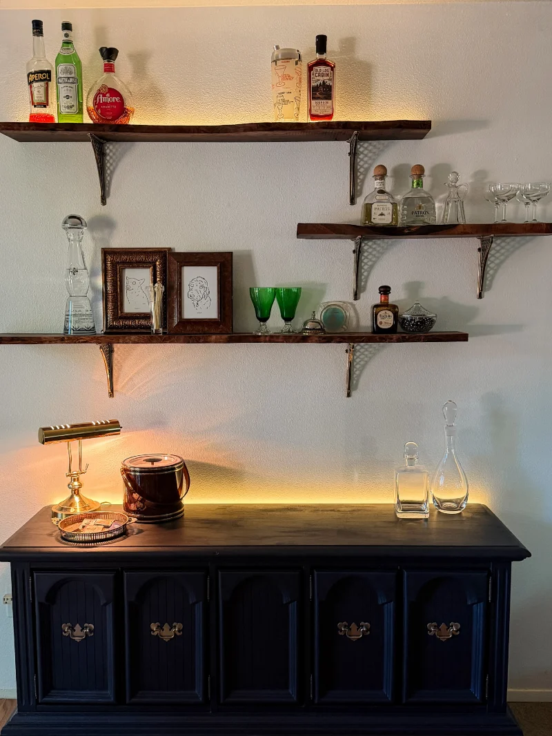 Dark Wood Bar Shelves with Metal Brackets and Vintage Glassware