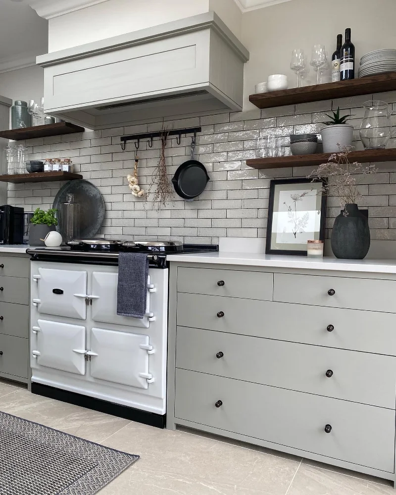 Dark Wood Shelves with Glassware, White Plates, and Matte Black Accents