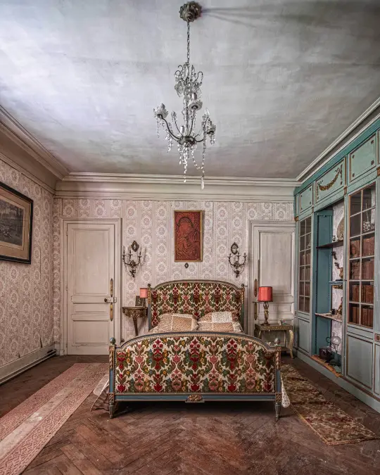 Faded Tapestries and Built-In Library Cabinets