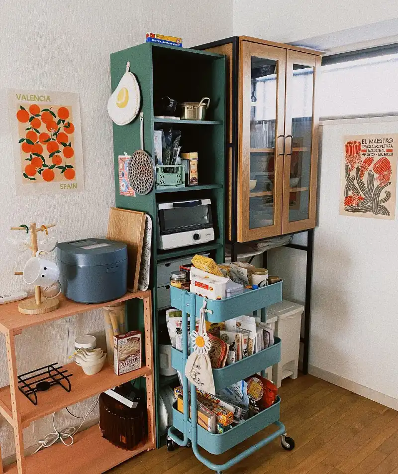 Forest Green Tall Pantry Unit with Turquoise Rolling Utility Cart