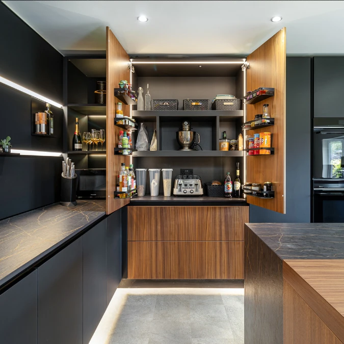 Hidden Metal Racks Streamline Dark Minimalist Kitchens