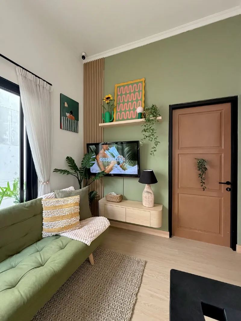 Olive Green Tufted Futon with Wood Slat Wall and Wavy Graphic Art