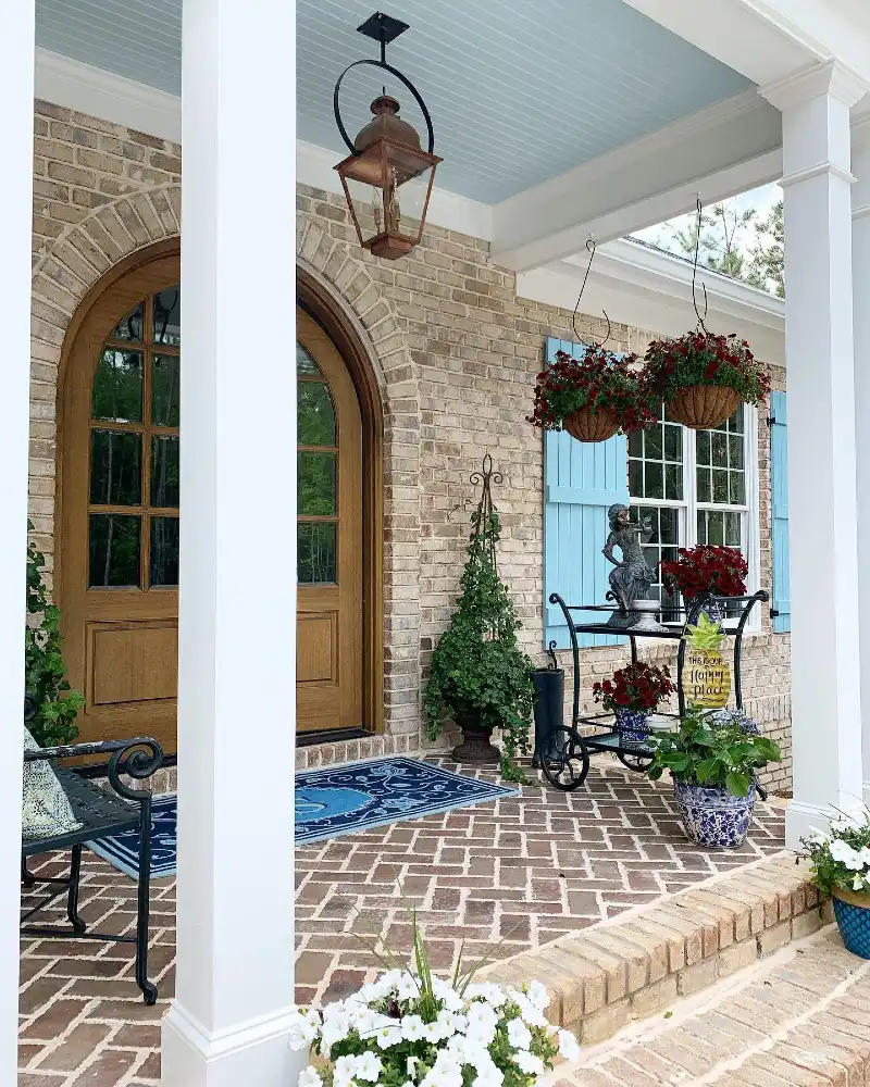 Pale Blue Beadboard Porch Ceiling with Hanging Copper Lantern