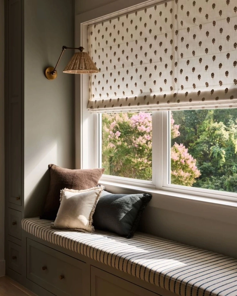 Printed Roman Shade Above a Striped Built In Window Bench