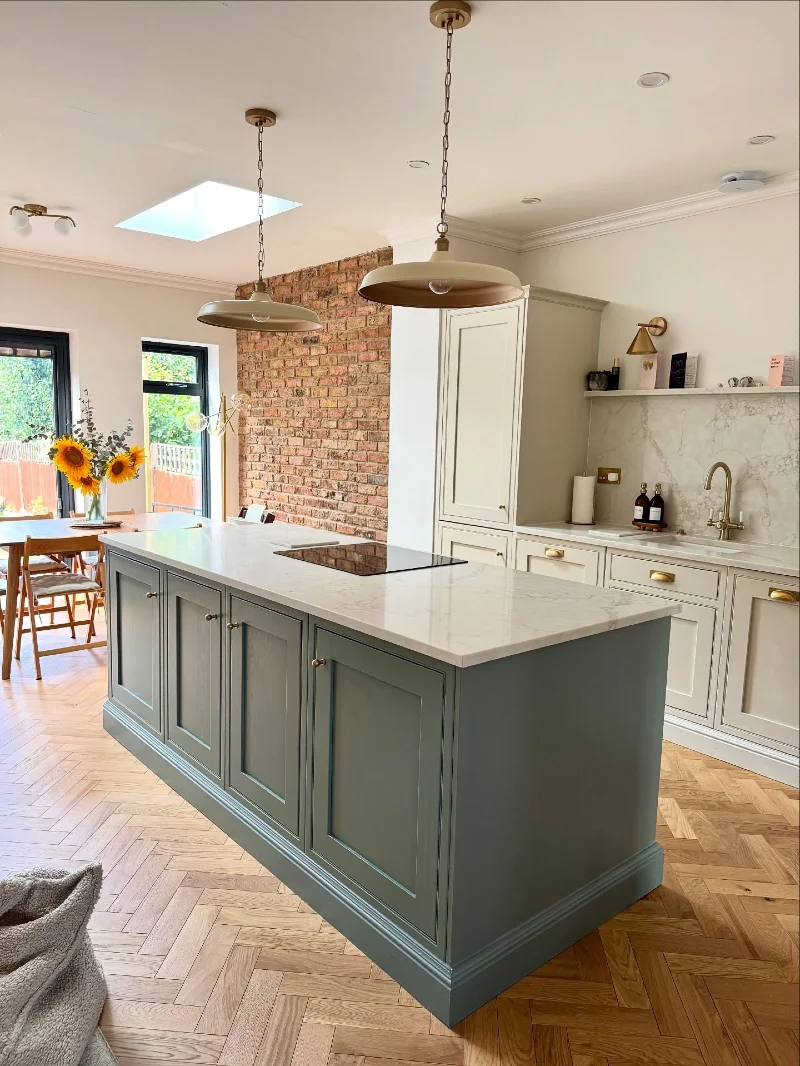 Sage Green Island with Built In Cooktop and Deep Cabinet Storage