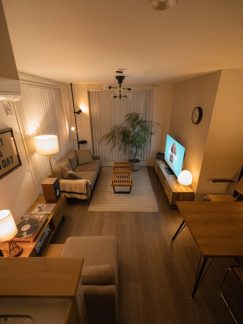 Slatted Wooden Coffee Table with Warm Mood Lighting and Record Player Nook