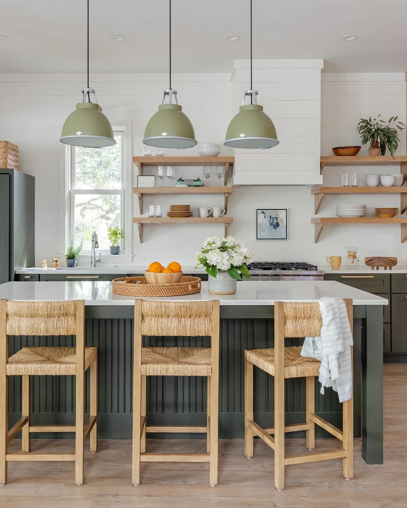 Split Wood Shelves with White Dish Stacks, Glassware, and Sage Green Lighting