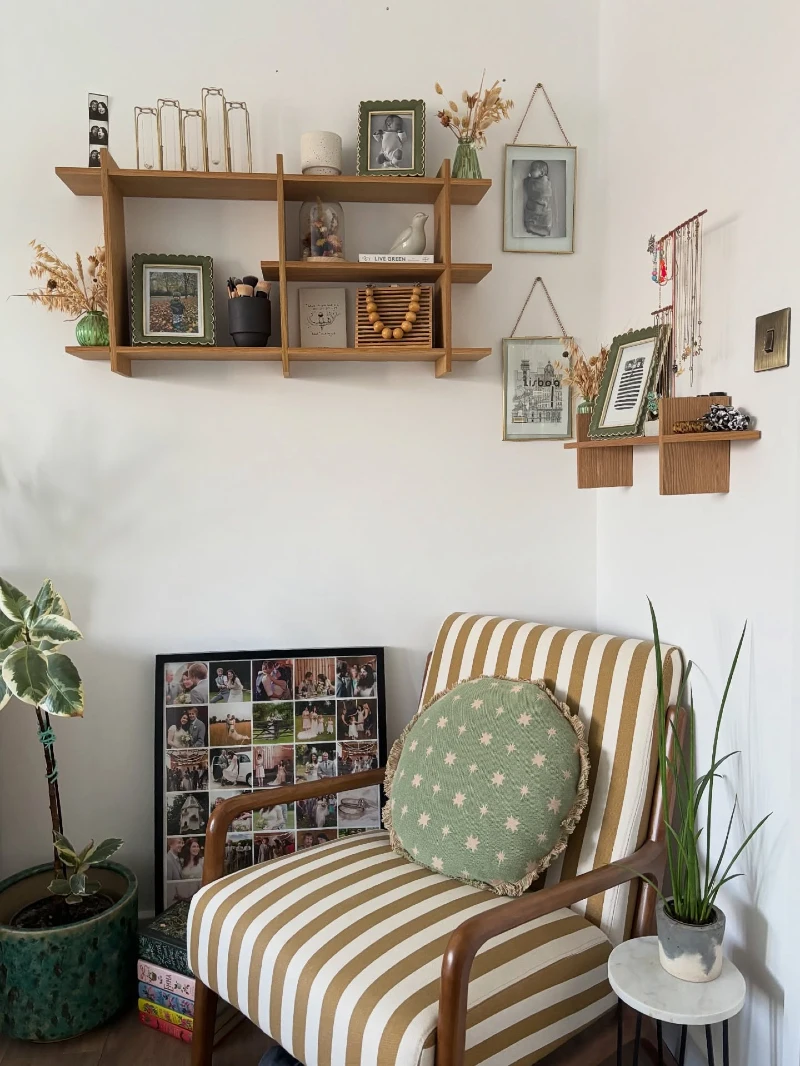 Striped Reading Chair with Floating Wood Display Shelves