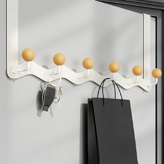 Wavy Metal Rack Softens Bedroom Entrances