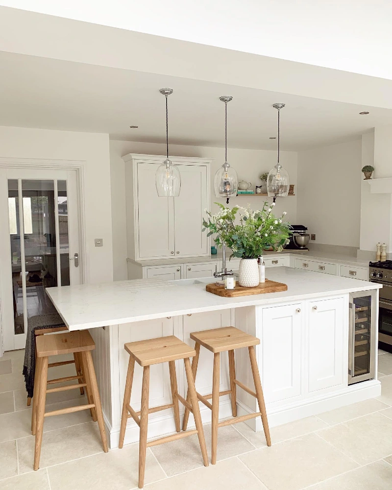 White Island with Sink, Wine Fridge, and Wooden Breakfast Stools